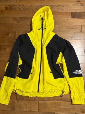 The North Face Yellow and Black Hooded Windfall Shell Jacket